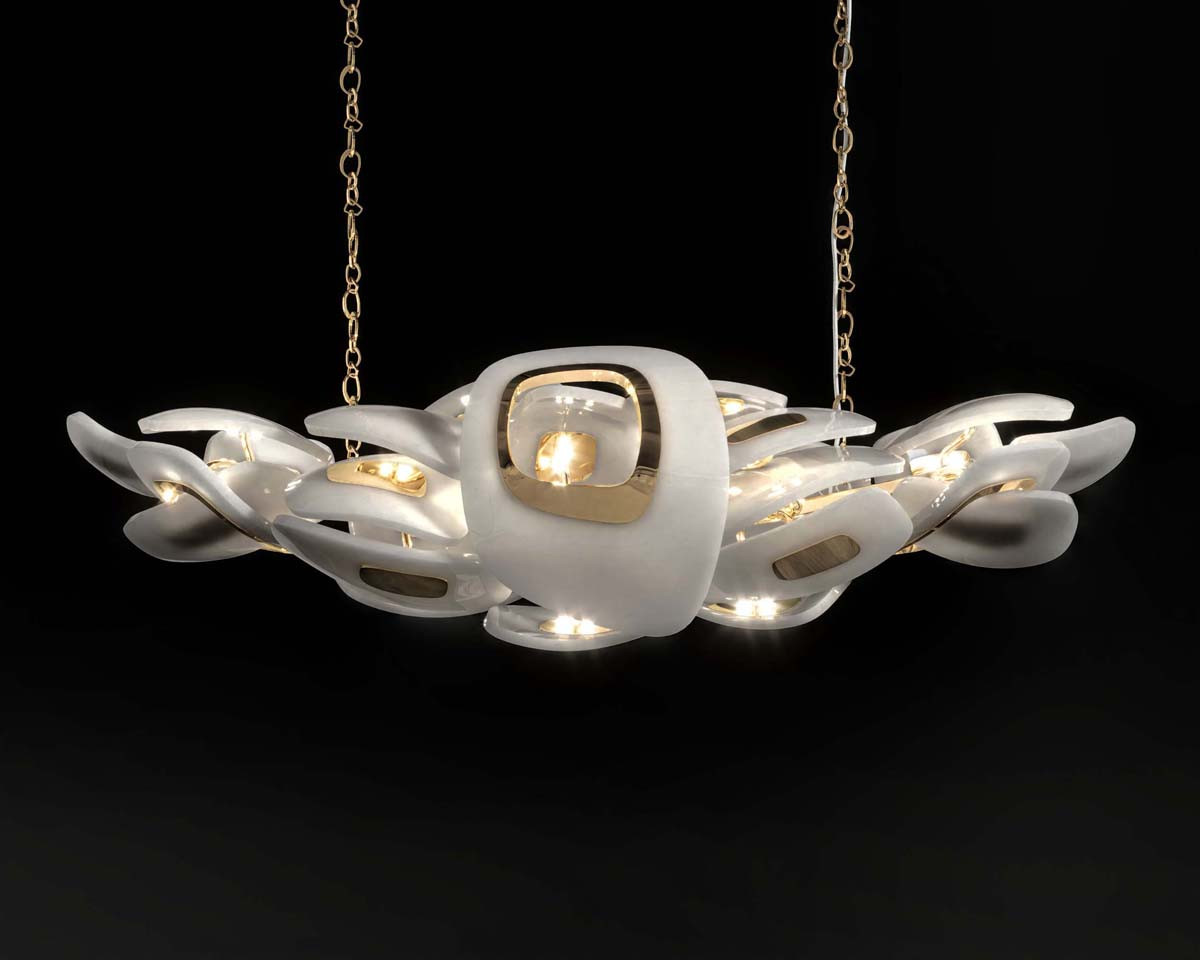 Swan horizontal chandelier in polished bronze and milk glass globe black background front shot