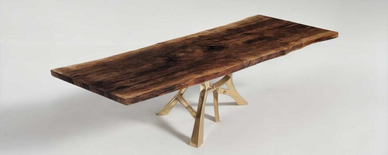 Vena dining table image in walnut live edge in a studio scene