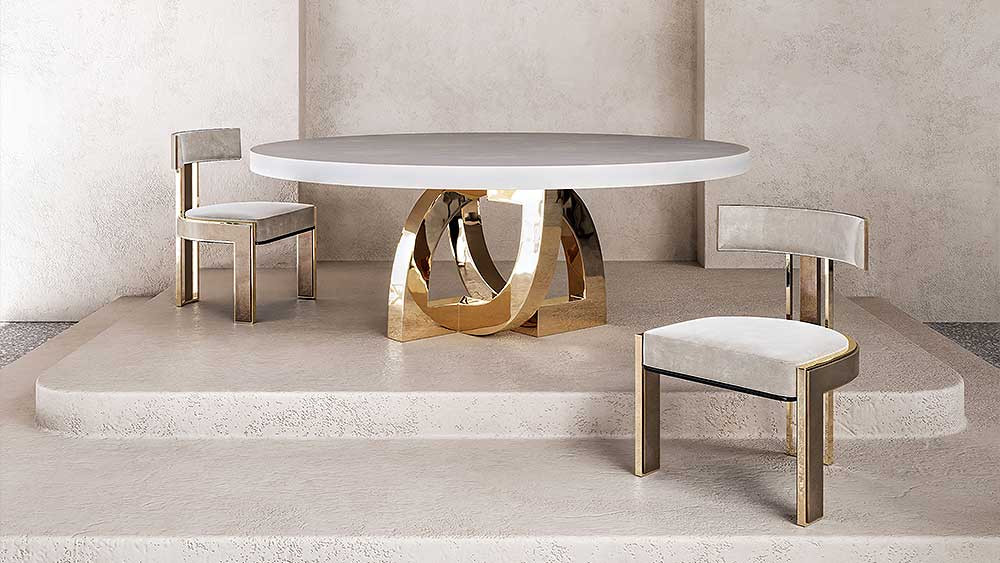 Arco round Dining Table with patina Bellus Dining Chairs in a stage scene