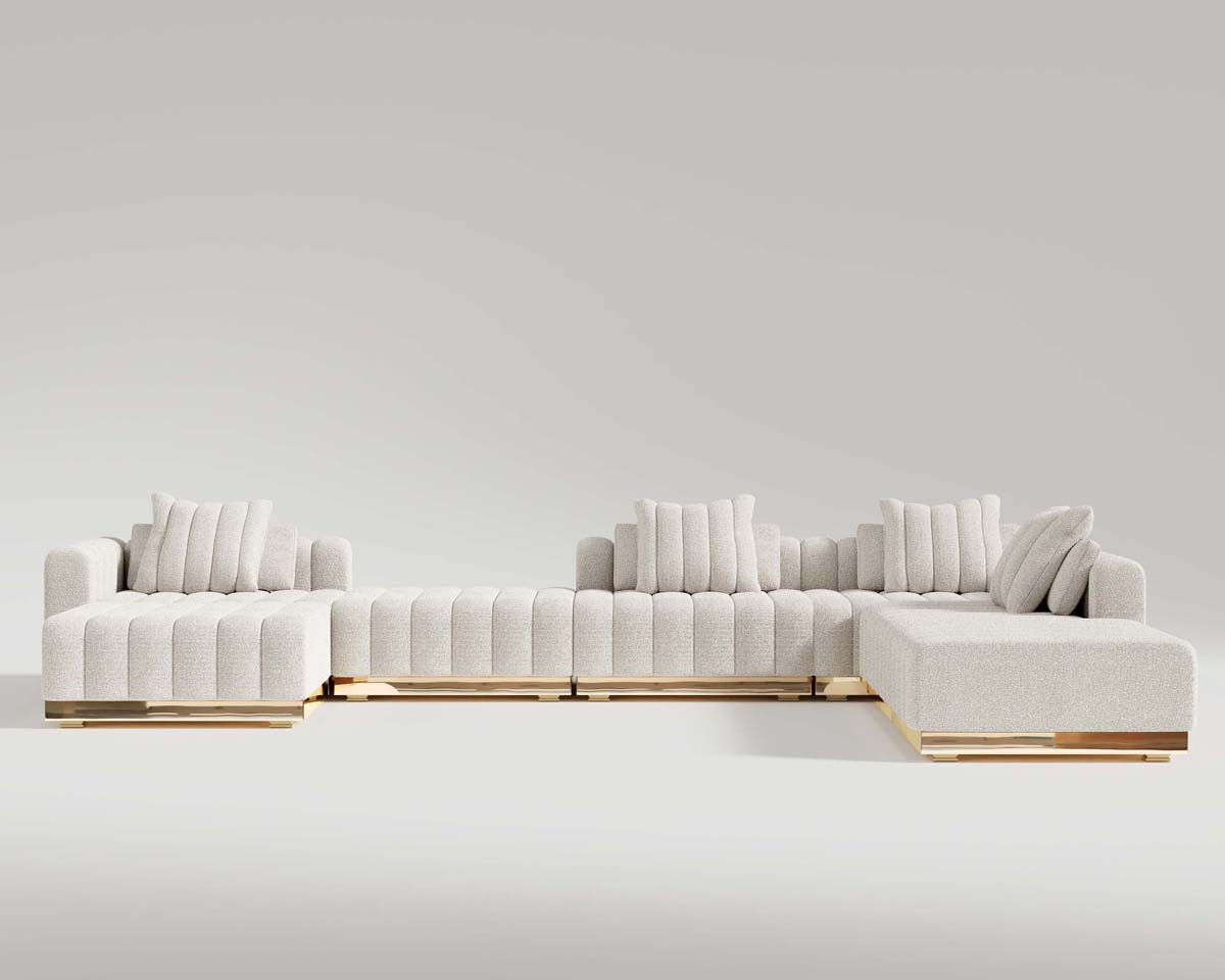 El mar modular sectional sofa in white fabric upholstery and polished bronze base front shot