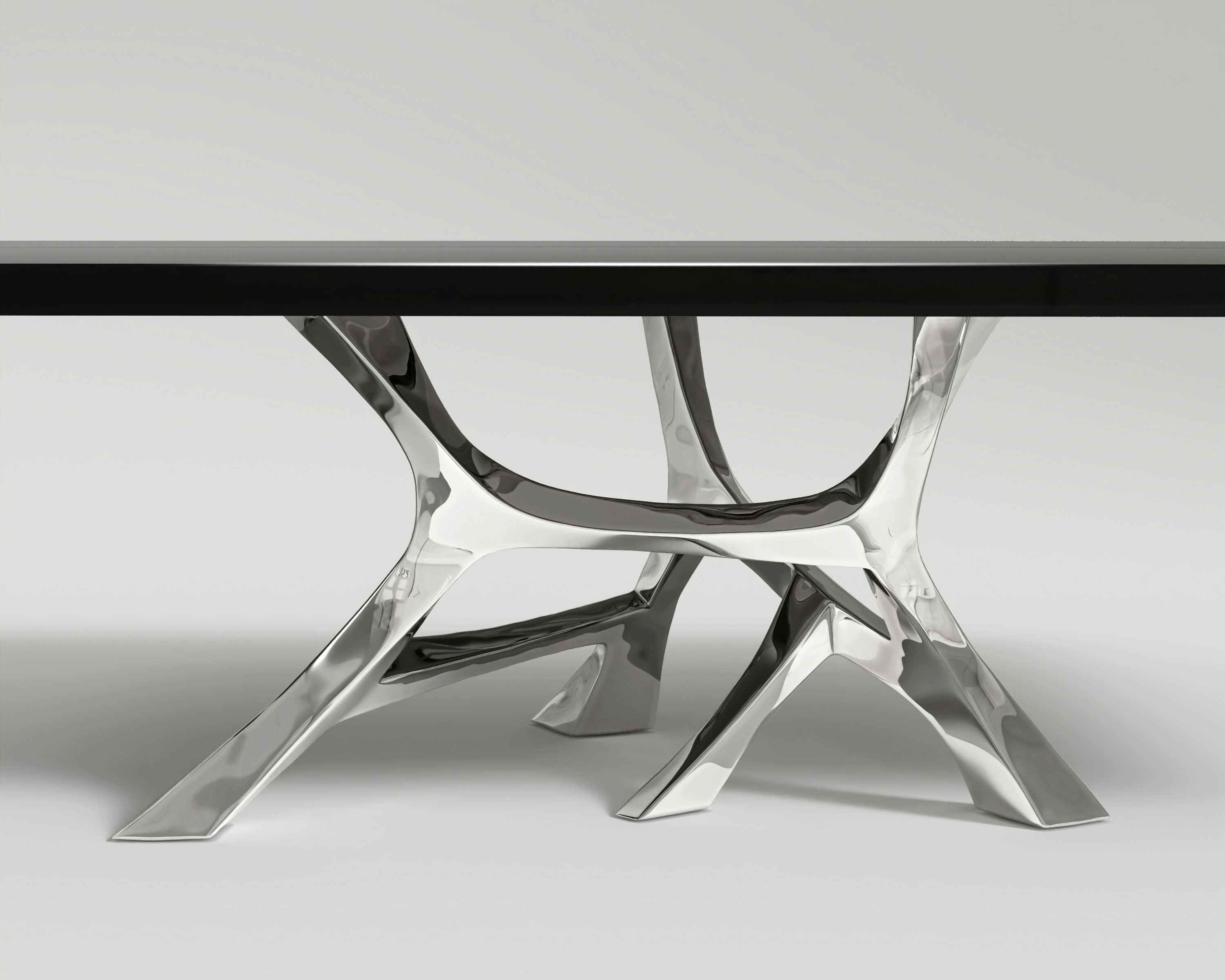 Vena Dining table, base close shot in polished SS