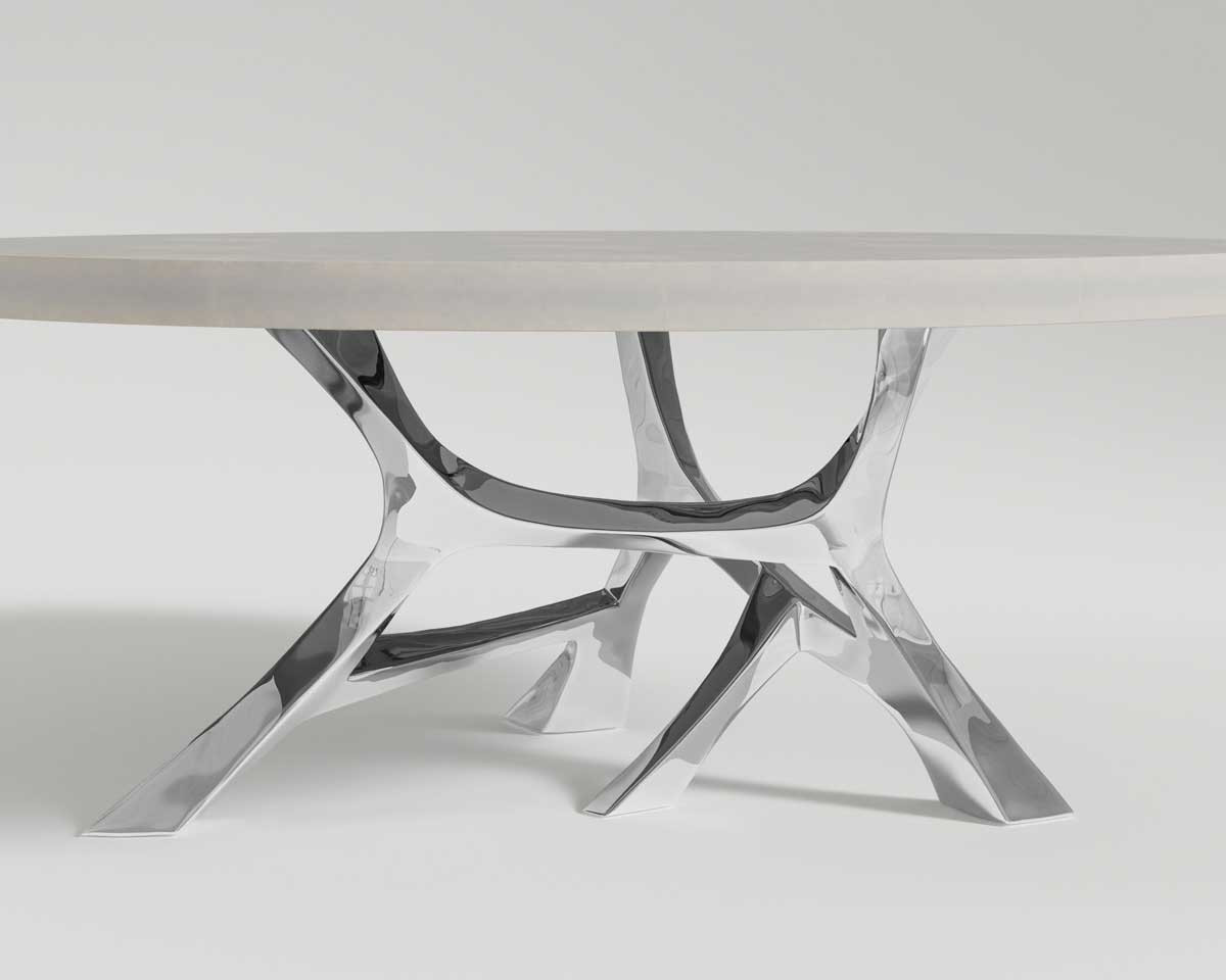 Vena Dining table, base close shot in SS and goatskin tabletop